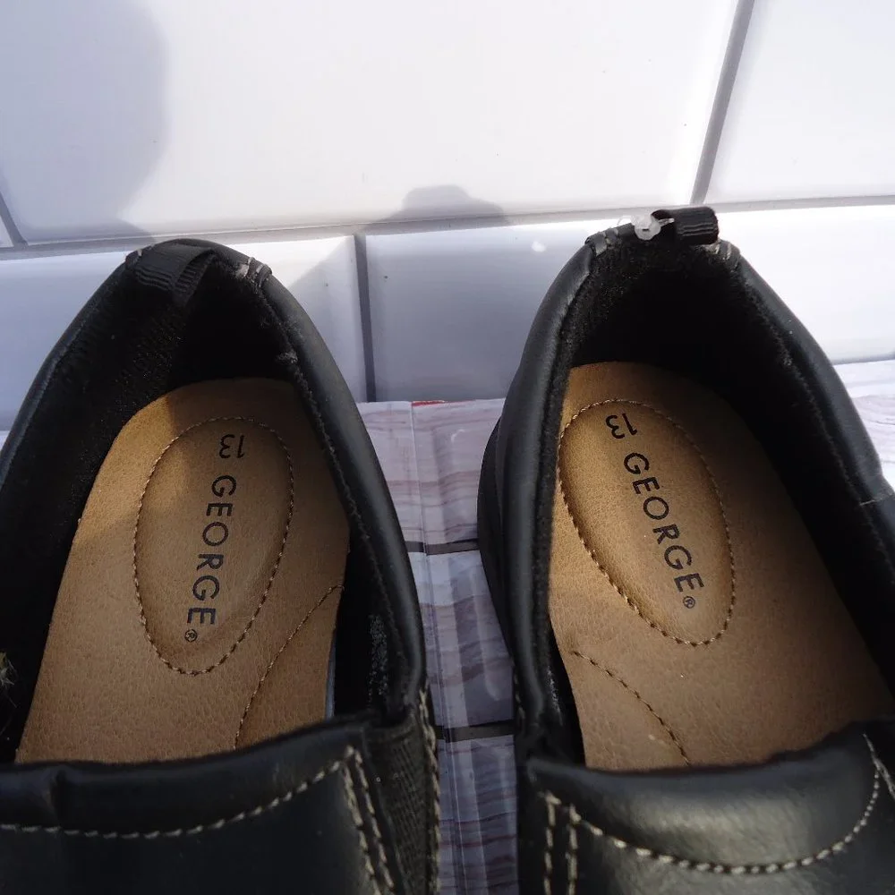 NWT. SIZE 13. George black slip-on formal /dress shoes.
